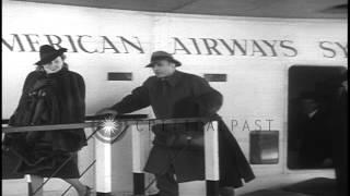 Screen actor Charles Boyer and his wife Pat Paterson leave a Clipper upon arrivin...HD Stock Footage