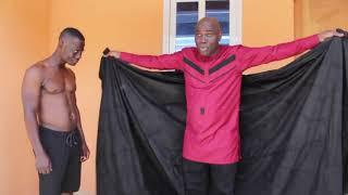 Nana teaches how to wrap men's traditional cloth