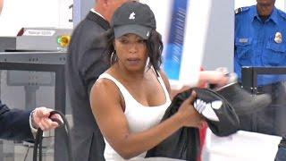 Angela Bassett Shows Of Her Biceps Going Through LAX TSA