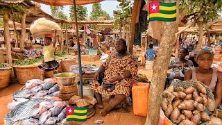 Rural African village market day in Togo  . Cheapest food Market Anfoin Togo  West Africa .