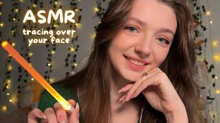 ASMR  tracing over your face 