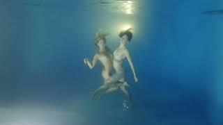 Underwater Art Nude performance - Night swimming pool, nude duet