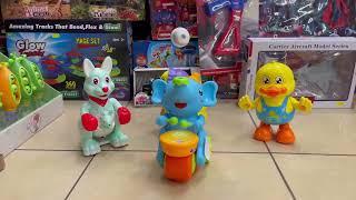 Dancing Toys in the Toy Store! 4 Interactive Toys to Get Your Kids Moving