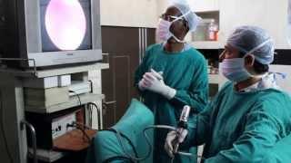 dr atul demonstrating optical internal urethrotomy for urethral stricture