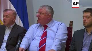 Serbian nationalist leader Seselj says he won't be at appeals hearing