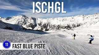 Skiing fast blue piste 11 in Ischgl Samnaun