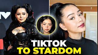 The Inspiring Journey of Bella Poarch from TikTok to Music Stardom - Starfall Chronicles