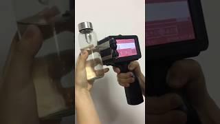 How to print graphic/ logo on the glass bottle surface? Handheld Portable Inkjet Code Printer