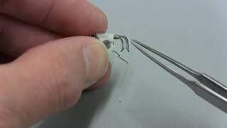 Adjusting a bent threader hook