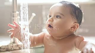 Baby In Awe Of Water Stream From Sink Faucet Stock Video   Download Video Clip Now