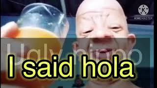 Bald guy drinks orange juice