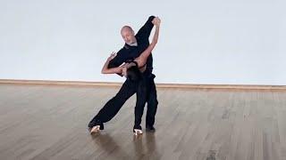 Andrew Sinkinson dancing foxtrot with Anastasia Milyutina