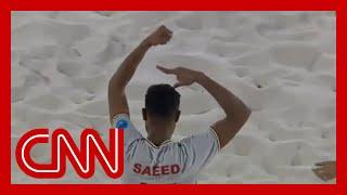 See Iranian soccer player appear to protest during tournament