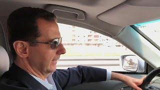 Assad filmed driving himself to the front lines of Syrian civil war