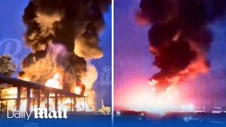 Ukrainian drones strike Russian oil storage tanks near Azov igniting large fire