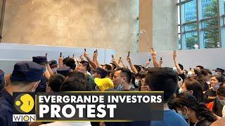 Evergrande investors protest outside the office & demand their money back | World English News