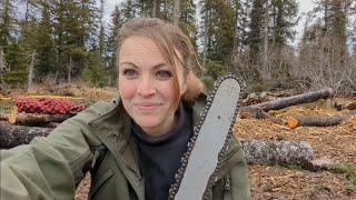 Solo Woman Clearing Land in Alaska