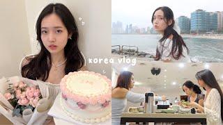 my last days in Korea vlog: trip to busan, healing beach, hitting 1M on youtube, pretty cafes