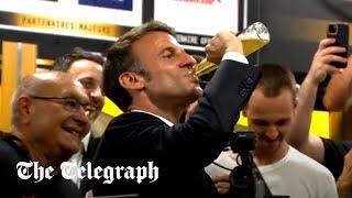 Emmanuel Macron downs a beer with French rugby champions Toulouse