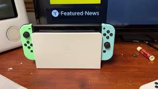 Does an original Nintendo Switch work in a Nintendo Switch OLED dock?