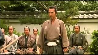 A samurai-ronin ( 浪人 ) displays his martial prowess to a local lord