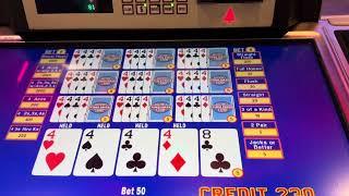 Dealt 4 fours. Triple double bonus video poker. Very happy with number of kickers.  Buffalo Creek.