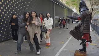 Funny Armor Prank Episode 5 in China. The girl was shocked when I responded to her greeting.