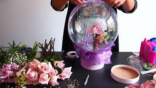 Easy DIY Bobo Balloon Fresh Flowers Centerpiece. Learn how to put flowers inside a balloon!
