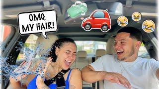 OPENING MY GIRLFRIEND'S WINDOW WHILE GOING THROUGH THE CARWASH *HILARIOUS*