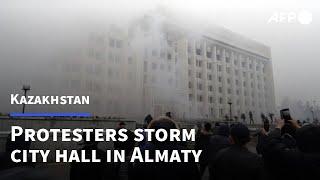 Almaty city hall stormed as Kazakhstan protests spin out of control | AFP