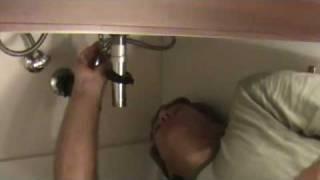 How to unclog a sink drain: Removing the plunger rod