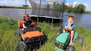 Using tractors on the farm to play in the water | Tractors for kids
