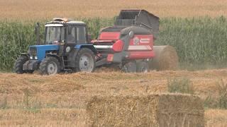 Professional level straw baling: MTZ-1221.2, John Deere 8420