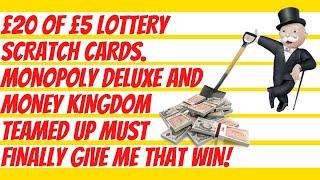 Lottery £5 scratch cards. £20 on show, including Monopoly Deluxe and Money Kingdom