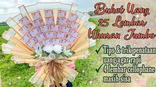 BUKET UANG Rp.5.000 SEBANYAK 25 LEMBAR WRAPPING 4 CELLOPHANE MASIH SISA