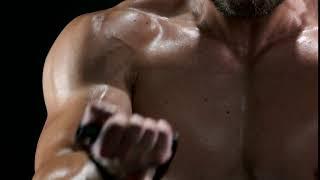 biceps and chest muscles of athletic man muscular body of a sportsman doing