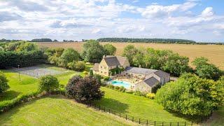 Equestrian home with 35 acres, helipad, swimming pool and tennis court