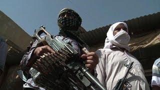 Embattled Iraqi Turkmen take up arms against militants