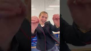 Doing TikTok in uniform tights school dance