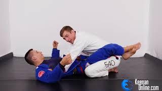 HOW TO ESCAPE THE MOST COMMON JIUJITSU ATTACK  - The closed guard escape. KEENANONLINE.COM