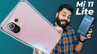 Mi 11 Lite Unboxing & First Impressions | Lite & Loaded?!  6.81mm Thin, 90Hz AMOLED, 64MP & More