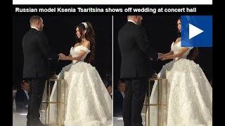 Russian model Ksenia Tsaritsina shows off wedding at concert hall