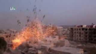 إنفجار هائل جراء إنفجار أربعة براميل متفجرة قبل قليل على مدينة داريا