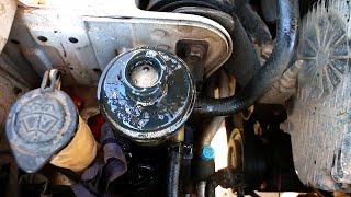 Power steering fluid foaming, overflowing. Pump makes Grinding Sound - Fix Cracked Hose on Pump