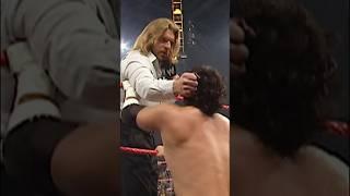 Tajiri mists Triple H right in the eyes!!