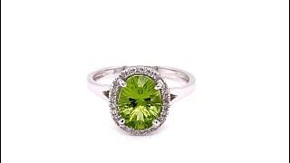 Towne Jewelers 14KW Oval Peridot With Round Diamond Fashion Ring