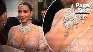 Watch the moment Kim Kardashian loses a massive diamond from necklace at $600M wedding