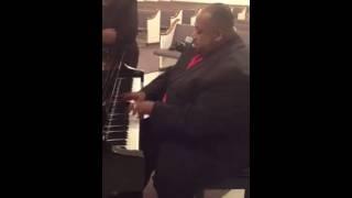 Bishop James E. Wiley Jr. playing the piano