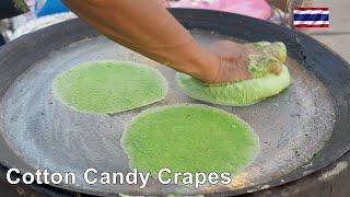 Thailand's Roti Sai Mai Cotton Candy Crapes Market Vendor hard at work.