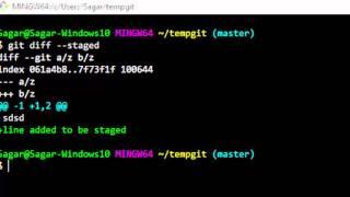 How to view changes between staging area and latest commit in git